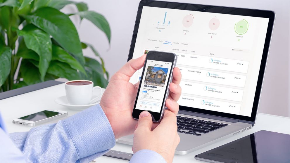 Mortgage Broker using Property Hub and RP Data on phone and laptop
